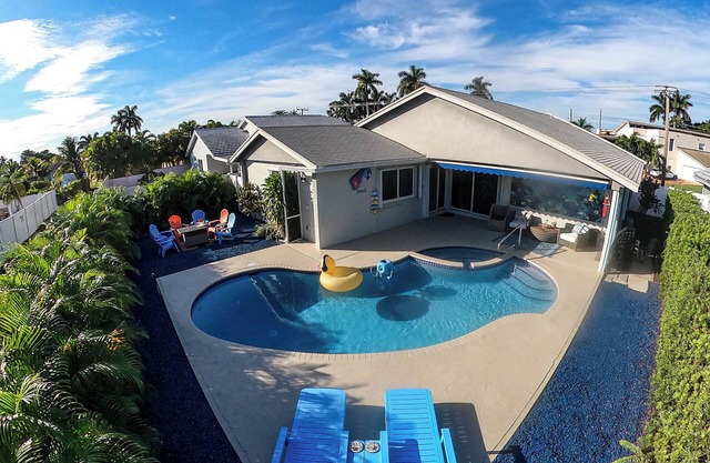 Coastal Chic Retreat:5 Min to Beach, Heated Pool, 4 BD , Near Casino & Parks!