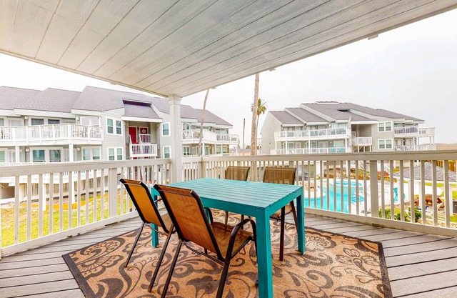 Coastal dune front condo with balcony, AC, pool, hot tub, & beach boardwalk