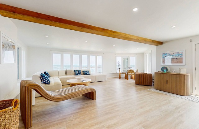 Coastal gem on the water with beach access, gorgeous views & spacious layout