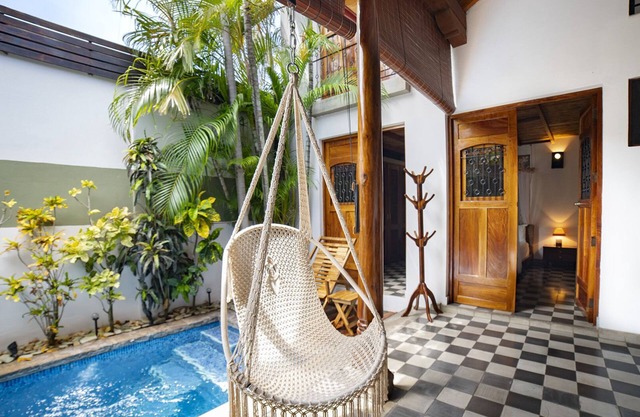 Colonial Elegance and Poolside Retreat