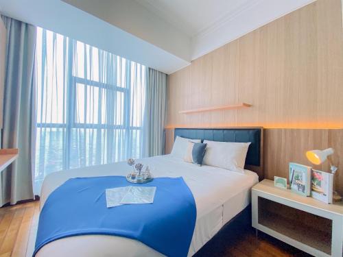 Comfort and Nice 2BR Apartment at Casa Grande Residence By Travelio