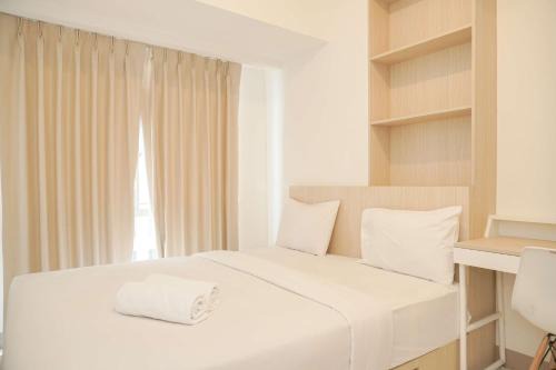 Comfort and Relaxing 2BR (No Kitchen) Tokyo Riverside PIK 2 Apartment By Travelio
