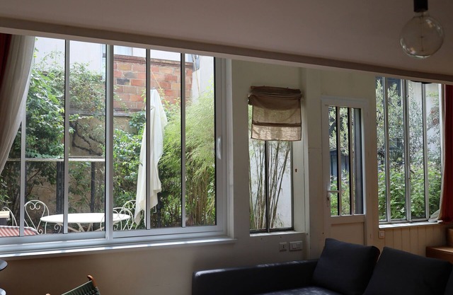 Comfortable, detached cottage with sunny, flower-filled terrace.