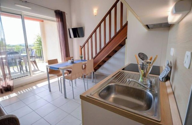 Comfortable Family Units with Kitchenettes & Seasonal Pool Access