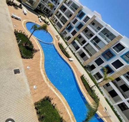 Complex martil con piscina y garage 2 habitaciones terraza grande y salón