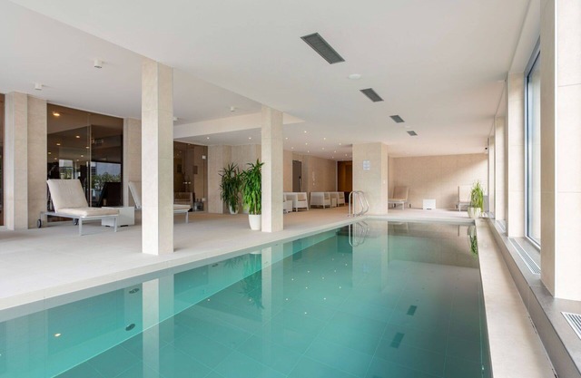 Cosy apartment for 4 people with WIFI, A/C, pool, hot tub, TV, balcony and panoramic view