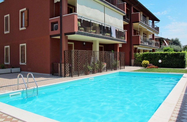 Cosy apartment for 4 people with WIFI, A/C, pool, TV and balcony