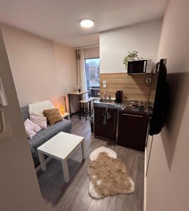 Cosy studio neuf avec balcon