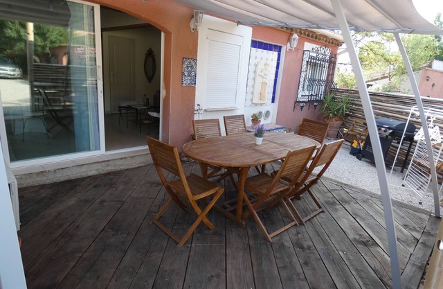 Cottage 'Lotus 1' with private terrace and shared heated pool