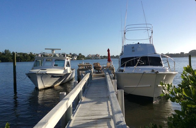 Cottage on the Bay with Sailboat Dock