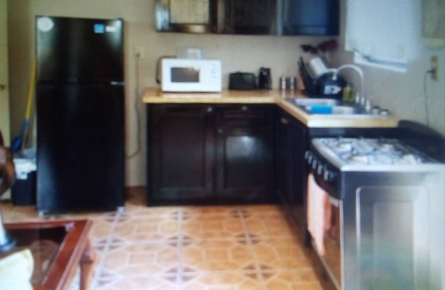 Cozy 1 bedroom studio apt with private entrance located near center of island.