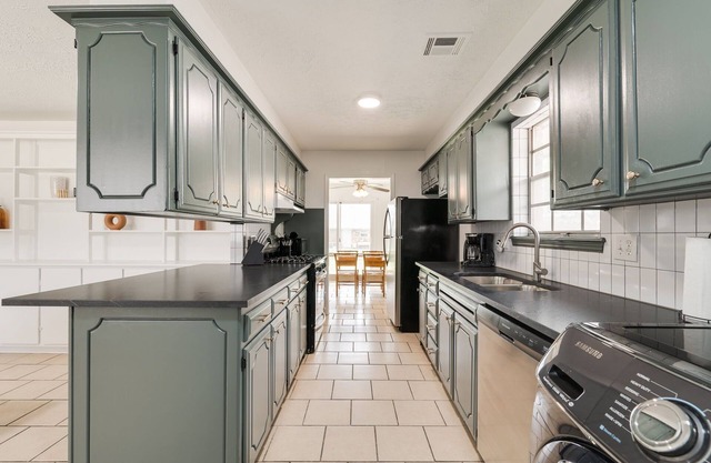 Cozy Home in NW OKC with garage & TVs in every room!