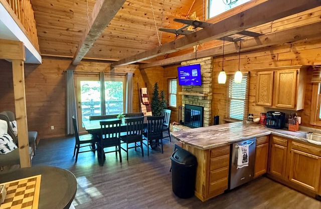 Cozy Log Cabin overlooking a pond with a fire pit, game area and rustic charm