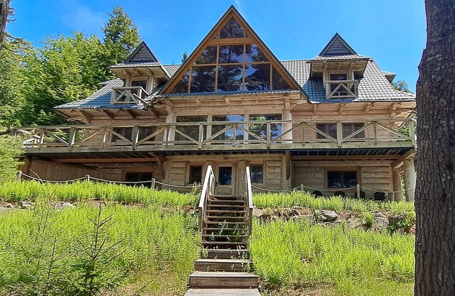 Custom lakefront lodge with game room, dock & plenty of space