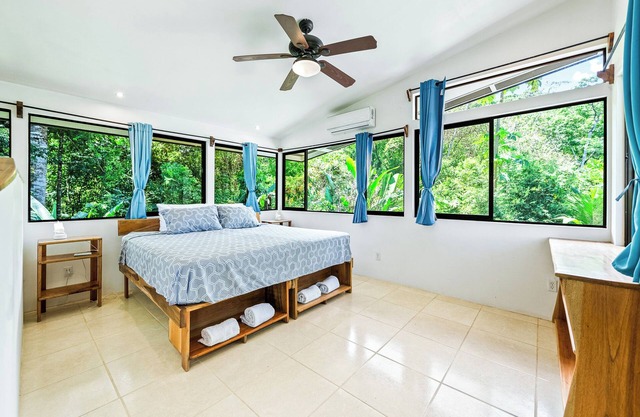 Custom Modern House w/AC, WiFi, ocean views, Amenities. Short walk to the beach