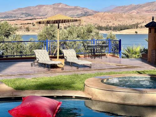 Dar NFis Suites et chambres de luxe dans un havre de paix vue paradisiaque au bord du lac