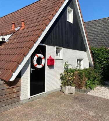 De Lauwersmeer Vogel mit eingezäuntem Garten