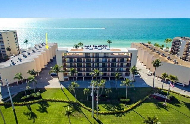 Directly on the BEACH! Million dollar view of the ocean! Swim, walk or relax!