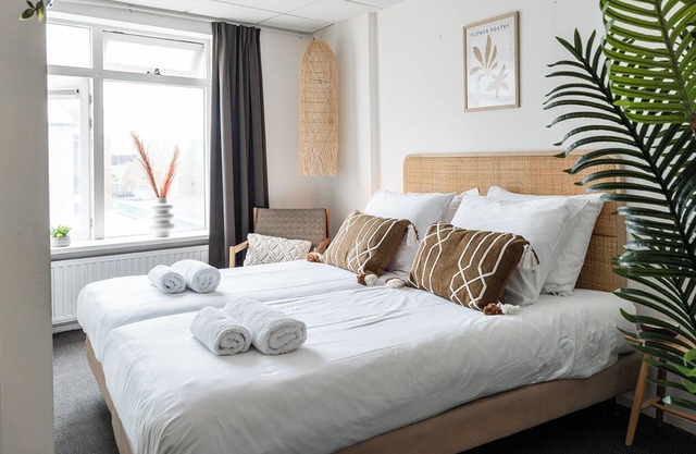 Discover the charm of a stylish small seaside room with Ibiza vibes, featuring a private bathroom.