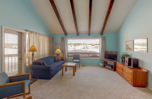 Dog-friendly condo w/covered porch & views - near golf, lakes & ski