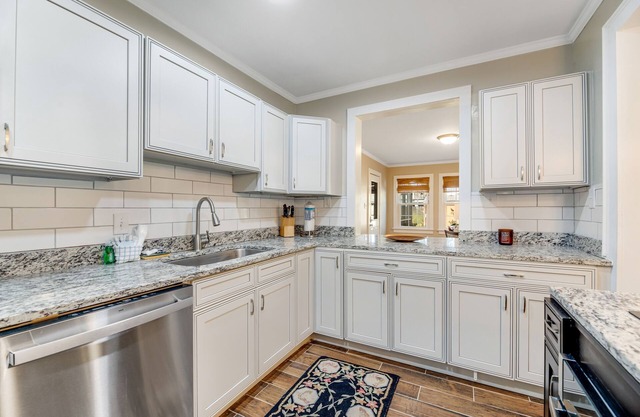 Dog-friendly home with updated interior, old-world charm, and alfresco dining