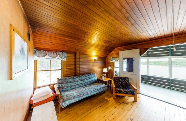 Dog-friendly retreat with porch, kayaks, & amazing views - right on the water