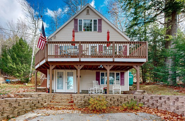 Dog-friendly retreat near the tranquil pond shore with spacious deck and dock