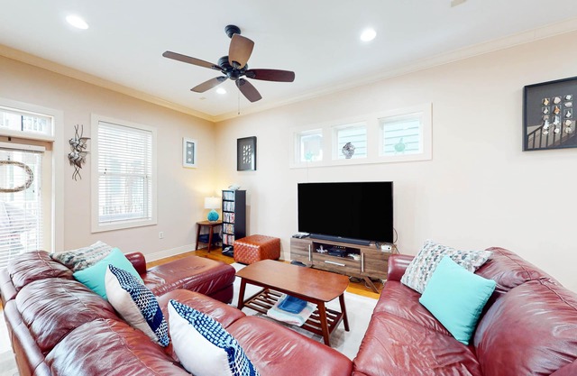 Dog-friendly home with balconies, foosball, pool access, & W/D - steps to beach