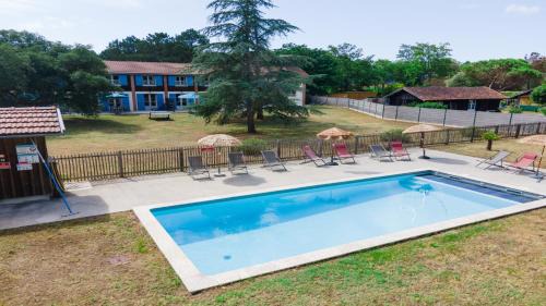 Domaine du Flamand - Gîtes du Flamand côté Piscine