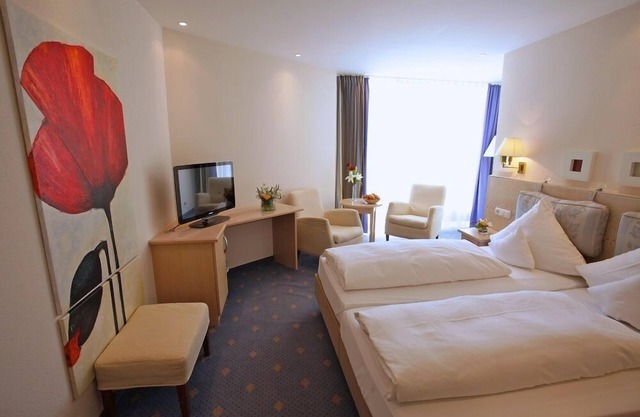 Double room south, 30 sqm, with shower/WC and balcony or terrace