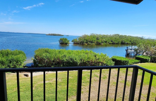 Enjoy gorgeous water views and incredible sunrises from this waterfront condo