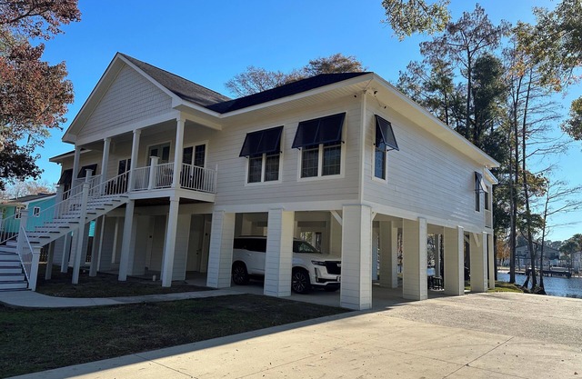 ENJOY THE SERENE LIFE OF THE NEWLY REMODELED WATERWAY HOUSE w Brand New Pool