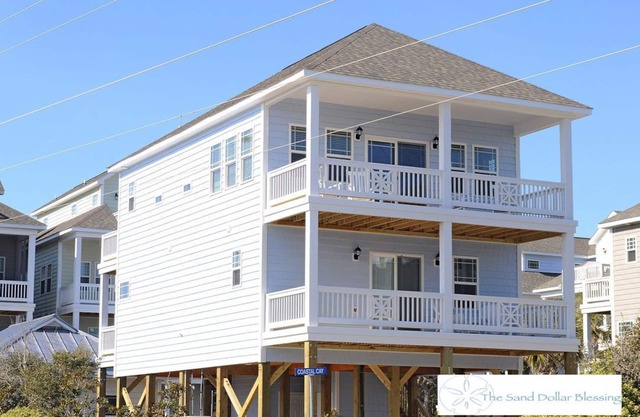 Escape to great views of the ocean & sound in this sun soaked reverse plan home