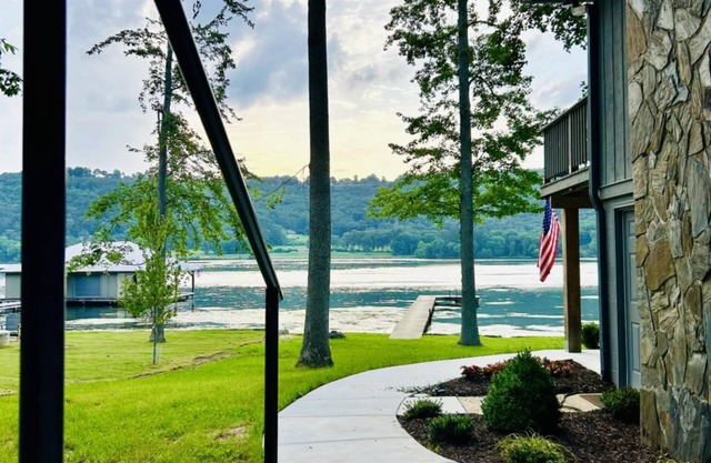Escape to our beautifully updated lakeside retreat, where every detail is designed for comfort and relaxation. From the moment you step inside this 3 bed/2bath house, you'll be captivated by sweeping, unobstructed views of the lake through expansive