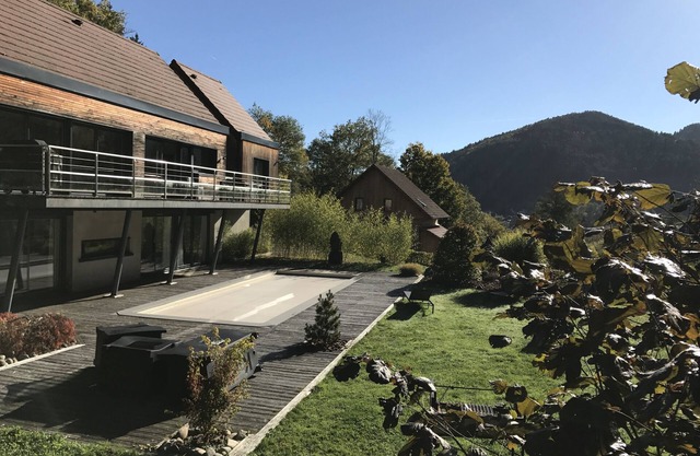 EXCEPTIONAL CONTEMPORARY CHALET baby foot, heated swimming pool from May to October