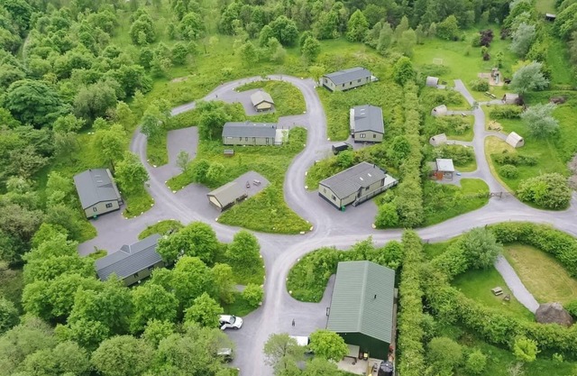 Experience the ultimate retreat in this stunning woodland lodge.
