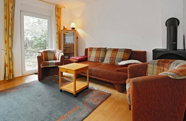 Family-friendly vacation home with south-facing terrace and wood-burning stove near the beach -