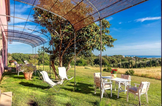 Farmhouse nestled in the countryside with sea view