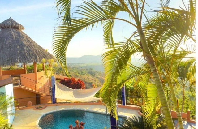 Find tranquility and escape tourism in this hillside home close to beaches