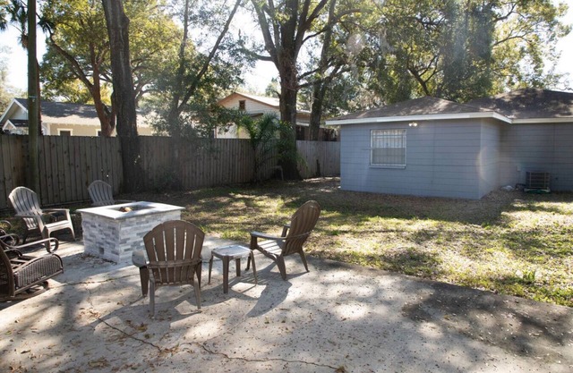 Fire Pit Fenced Backyard Board Games