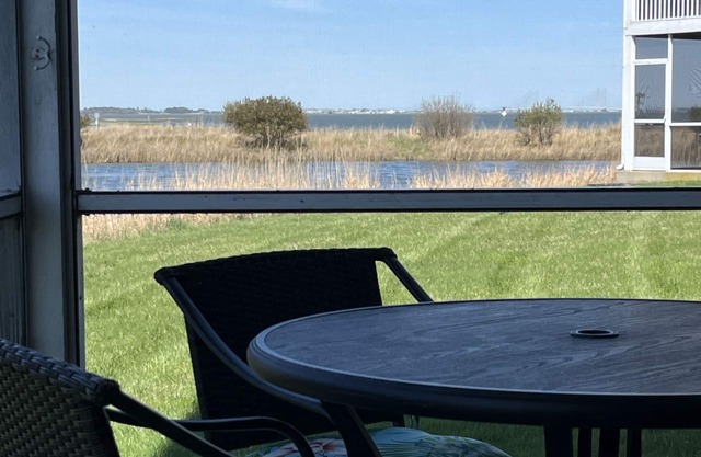 First floor end unit condo with stunning scenic bay water view!