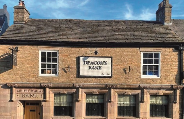 Former 18th century bank, now two contemporary apartments with Michelin Guide rated restaurant