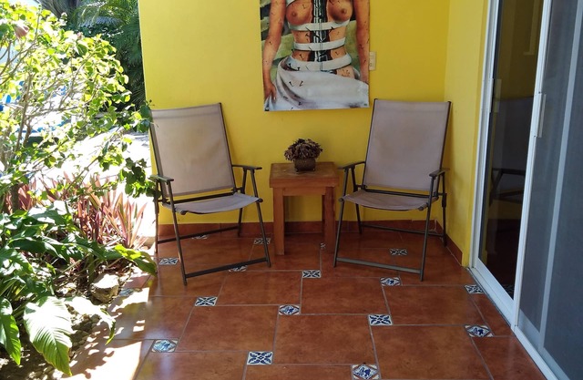 Frida -Beautiful Condo with Private Terraza, Large Pool, A/C & Parking