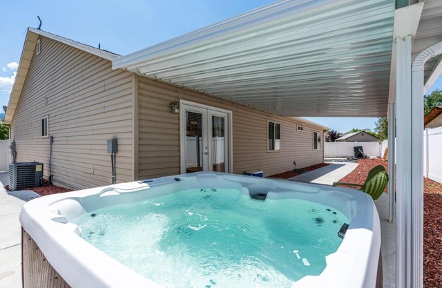 Fully Stocked Home with Hot Tub and Private Yard