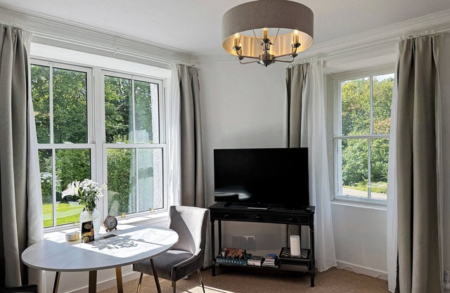 Garden Flat - set in beautiful large garden with old church ruins on the grounds