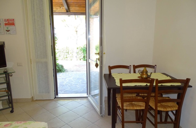 Ginepro apartment in a holiday home with park and swimming pool