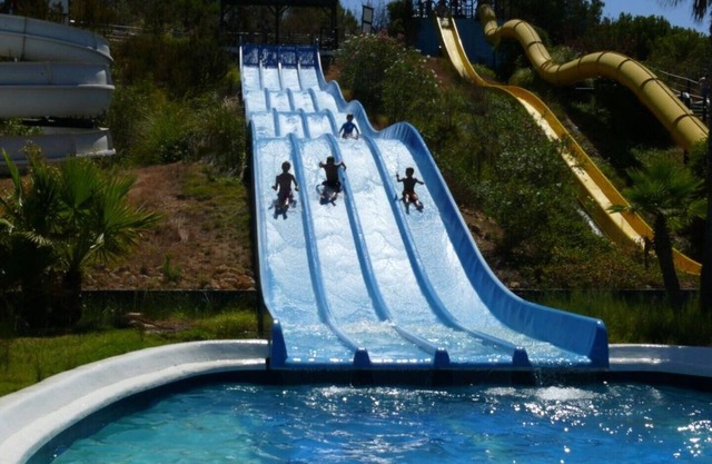 Golf & beach town house, friendly small complex with pool & FREE WiFi