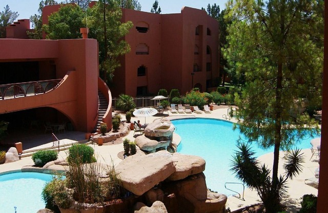 Golf Course & Sparkling Pool View! Gated Complex & Ground Floor Condo