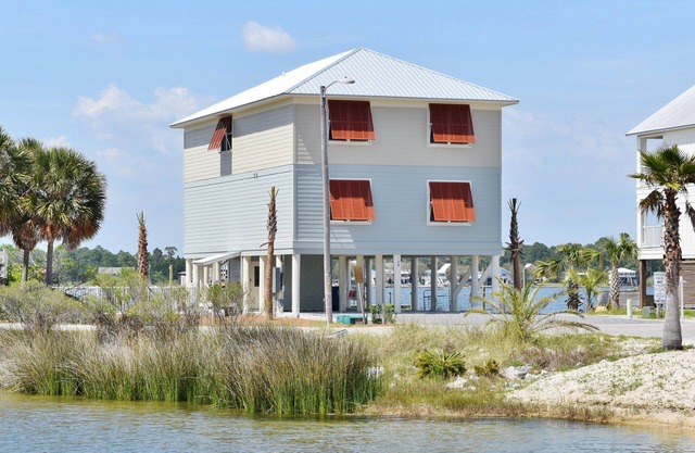 Good Time Charlie by GSVR | Lagoonfront Home w/Pool, Firepit & Beach Access + FREE Activities/Golf