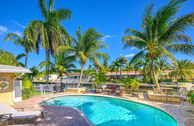 Gorgeous Canal Home w/ Heated Private Pool and Dock - Near Beach